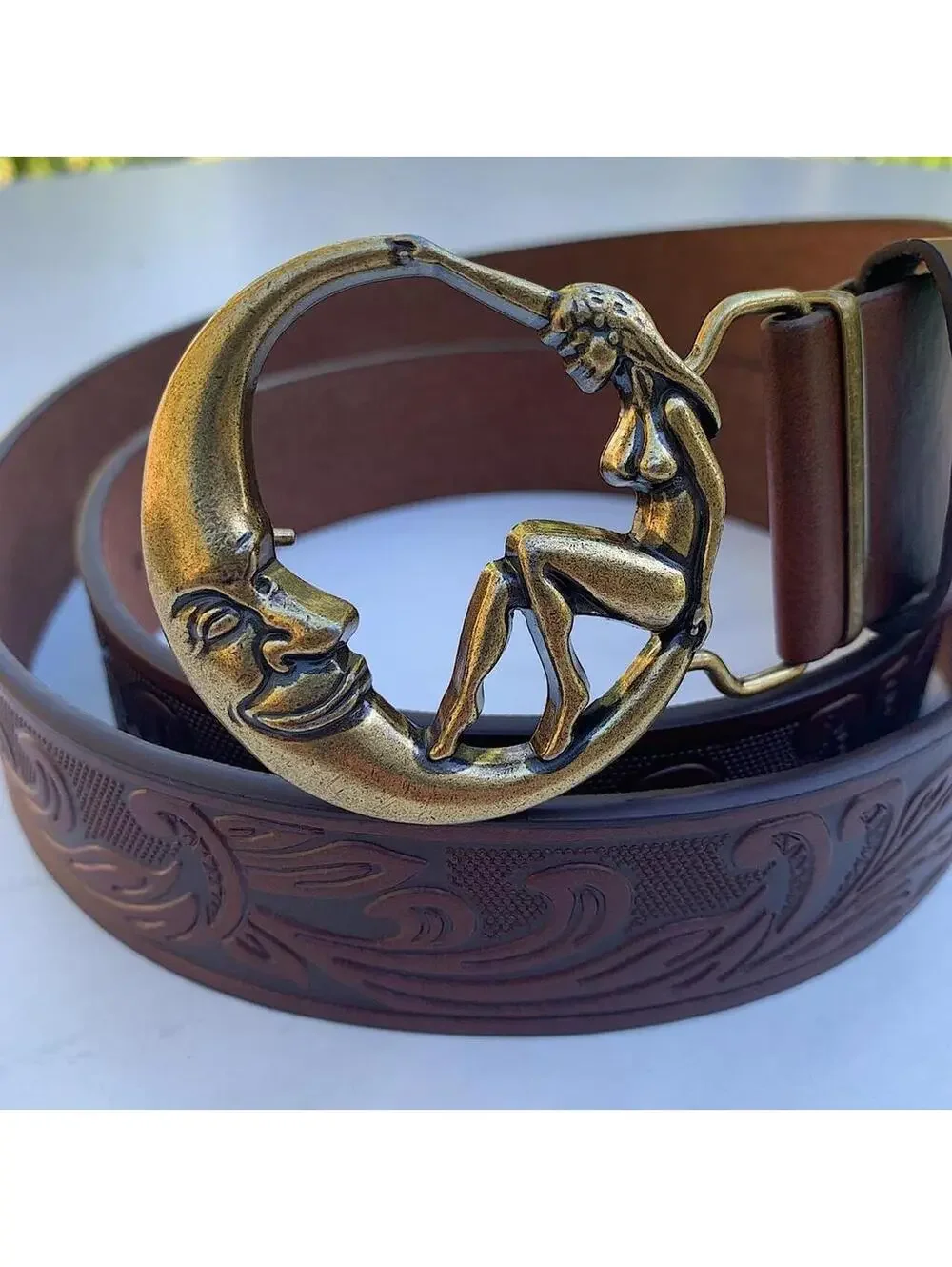 Half moon and Woman belt buckle brown belt. 44 inches length